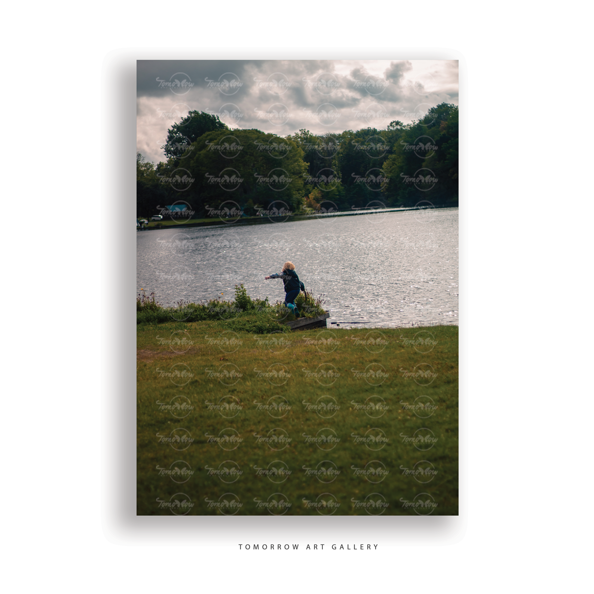 Child by the lake