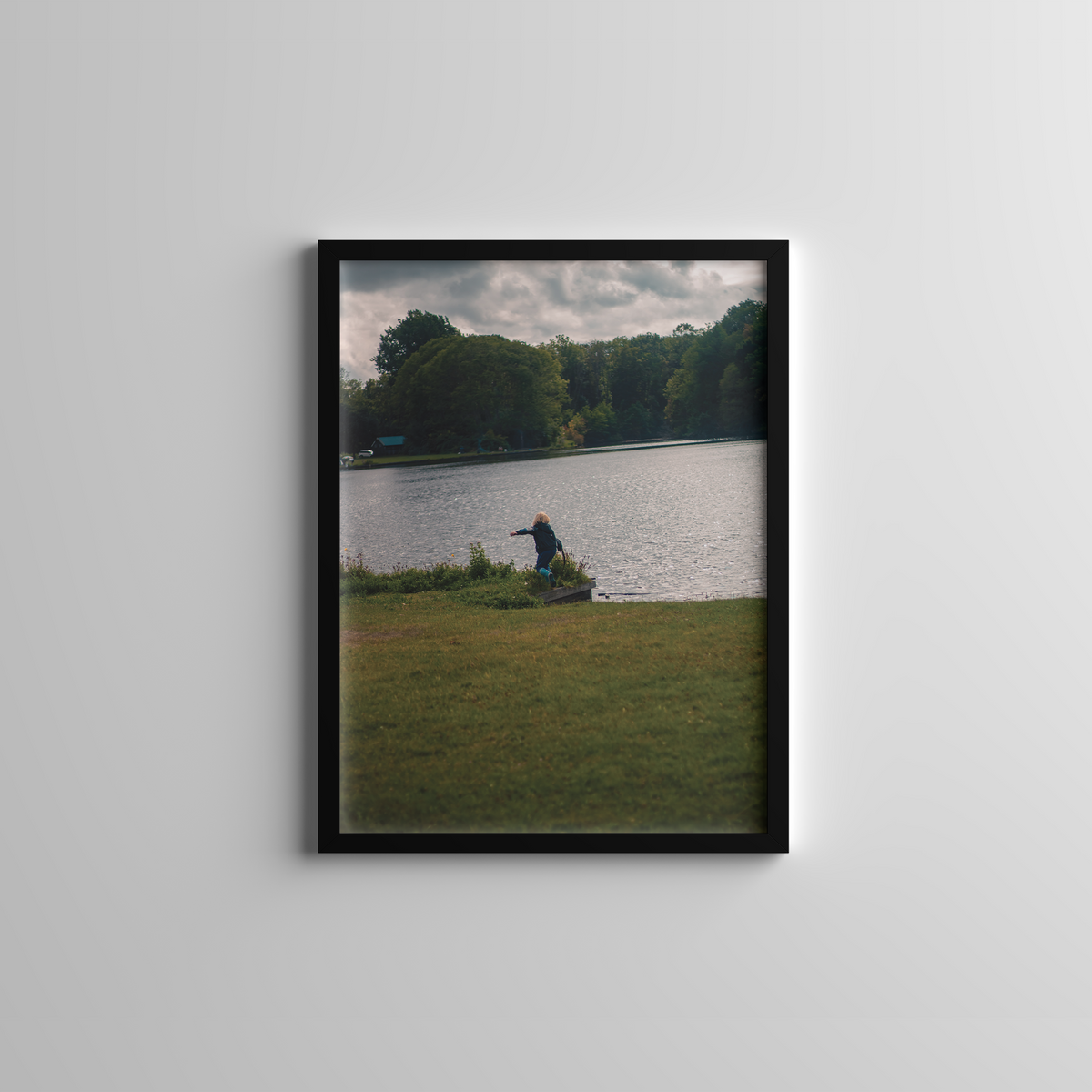 Child by the lake